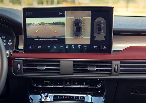 The driver of a 2024 Lincoln Corsair® SUV is shown selecting the drive mode. | Ted Britt Chantilly Lincoln in Chantilly VA