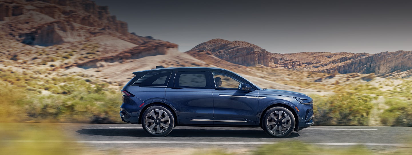 A 2024 Lincoln Nautilus® SUV is being driven in a desert setting. | Ted Britt Chantilly Lincoln in Chantilly VA