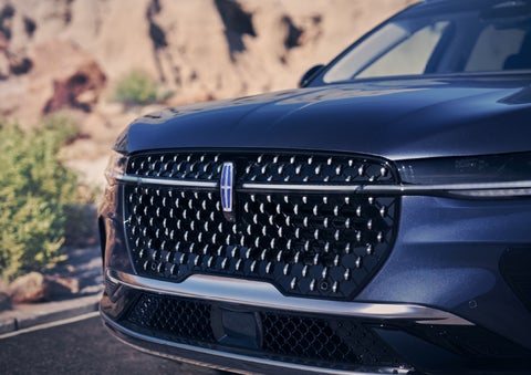 The stylish grille of a 2024 Lincoln Nautilus® SUV sparkles in the sunlight. | Ted Britt Chantilly Lincoln in Chantilly VA