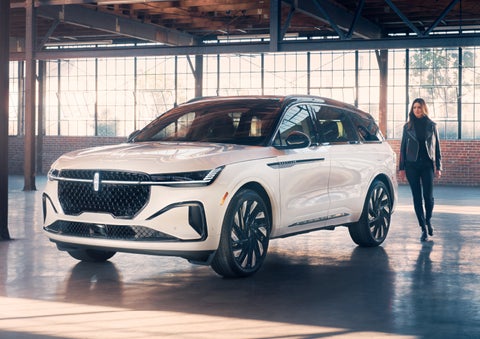 A person approaches a 2024 Lincoln Nautilus® SUV. | Ted Britt Chantilly Lincoln in Chantilly VA