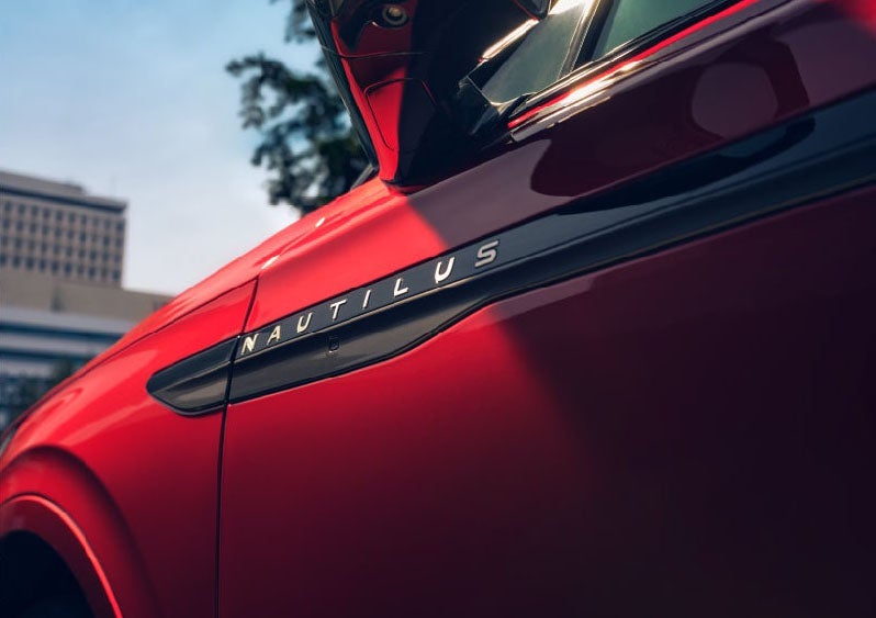 A side badge on the passenger door reads Nautilus. | Ted Britt Chantilly Lincoln in Chantilly VA