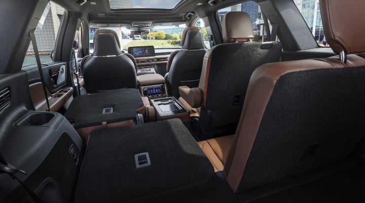 One side of the PowerFold® third-row seat and a second-row seat are folded forward in the 2026 Lincoln Aviator® SUV. | Ted Britt Chantilly Lincoln in Chantilly VA