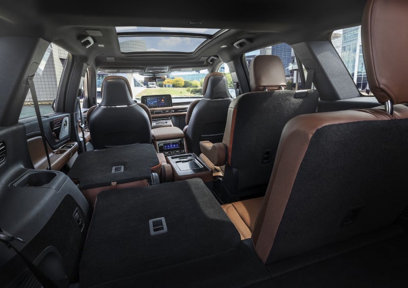 One side of the PowerFold® third-row seat and a second-row seat are folded forward in the 2026 Lincoln Aviator® SUV. | Ted Britt Chantilly Lincoln in Chantilly VA