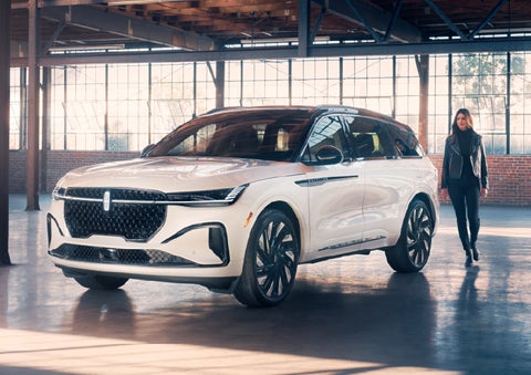 A person approaches a 2026 Lincoln Nautilus® SUV. | Ted Britt Chantilly Lincoln in Chantilly VA