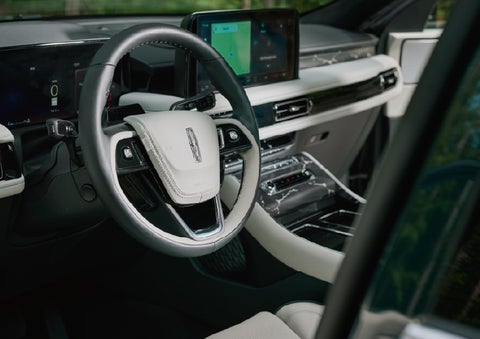 The leather-trimmed steering wheel of a 2027 Lincoln Aviator® Black Label™ SUV. | Ted Britt Chantilly Lincoln in Chantilly VA
